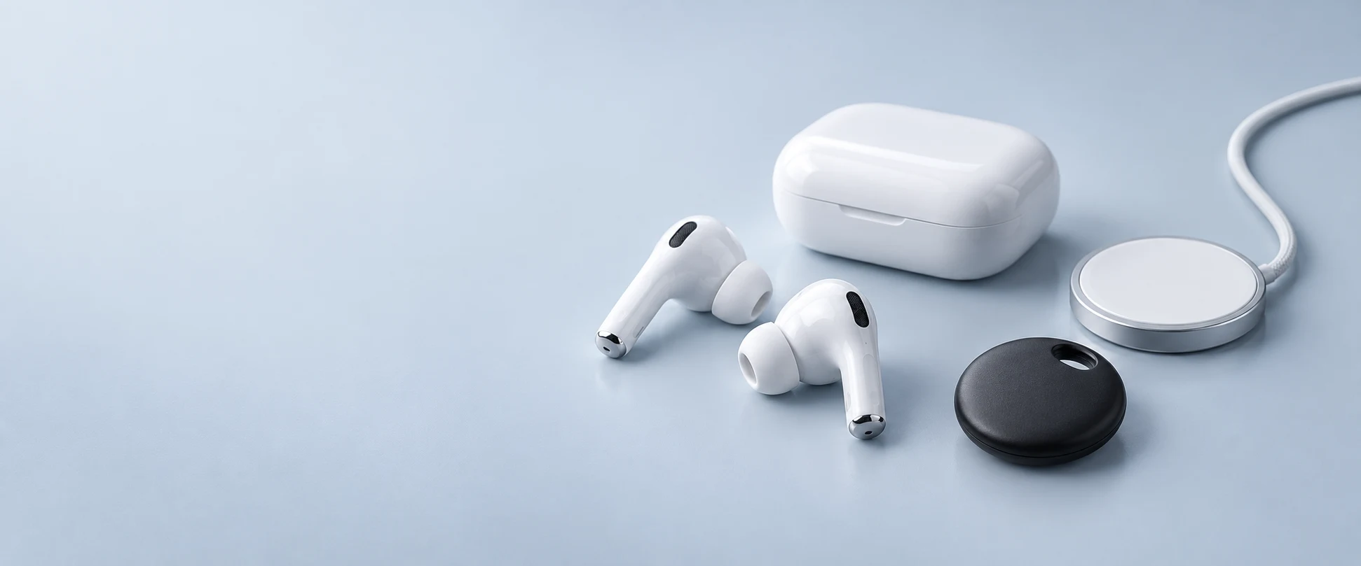 Wireless earbuds, charging accessories and a tracking tag